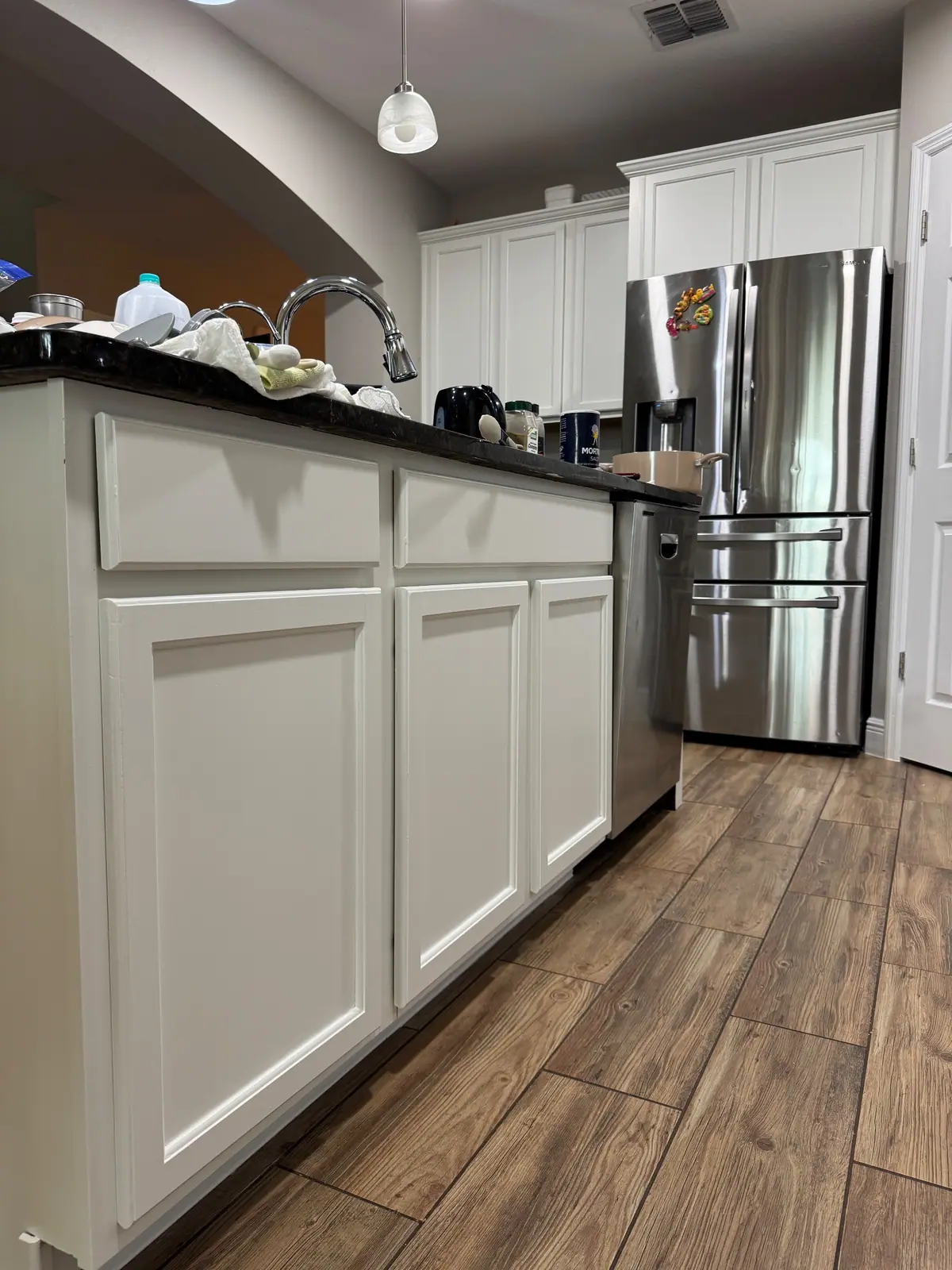 Kitchen island cabinets painted bright white