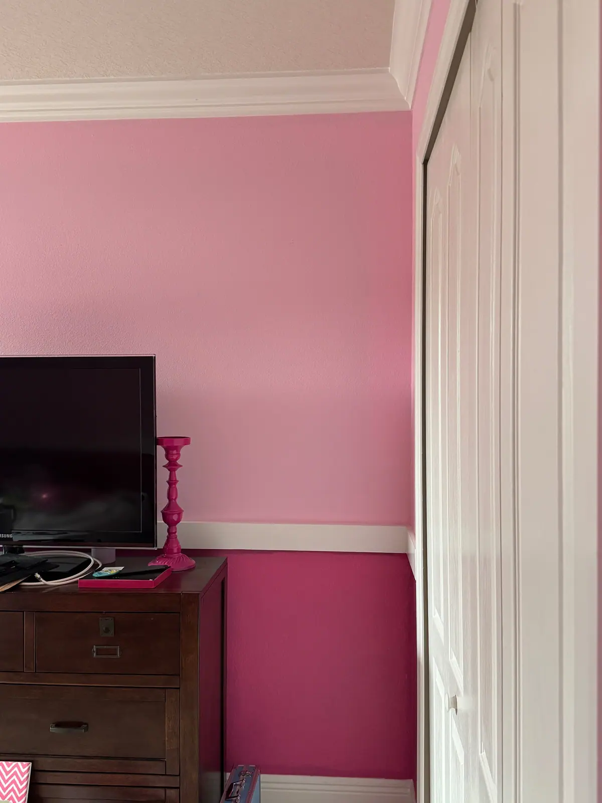 Two-tone pink bedroom walls and trim by BR Painting